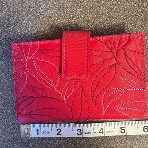 Travelon wallet. Red and purple. NWOT